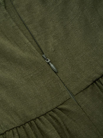 Linblandad Plisserad Jumpsuit Med Fyrkantig Hals Och Korsdetalj